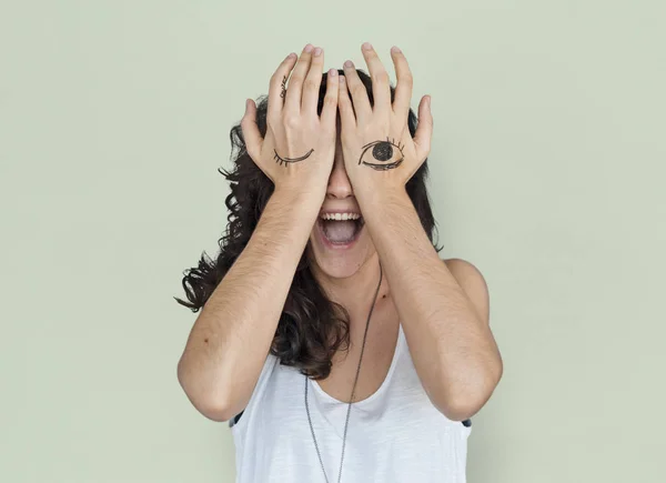 Woman with drawing eyes on the hands — Stock Photo, Image