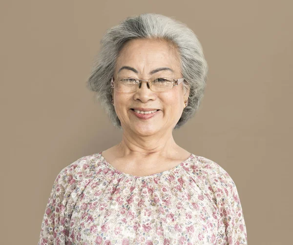 Senior woman posing in studio — Stock Photo, Image