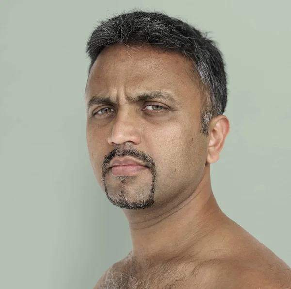 serious indian man face