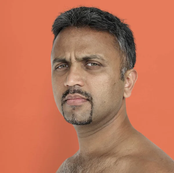 serious indian man face