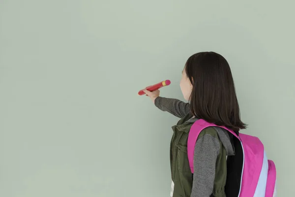 Menina segurando lápis — Fotografia de Stock