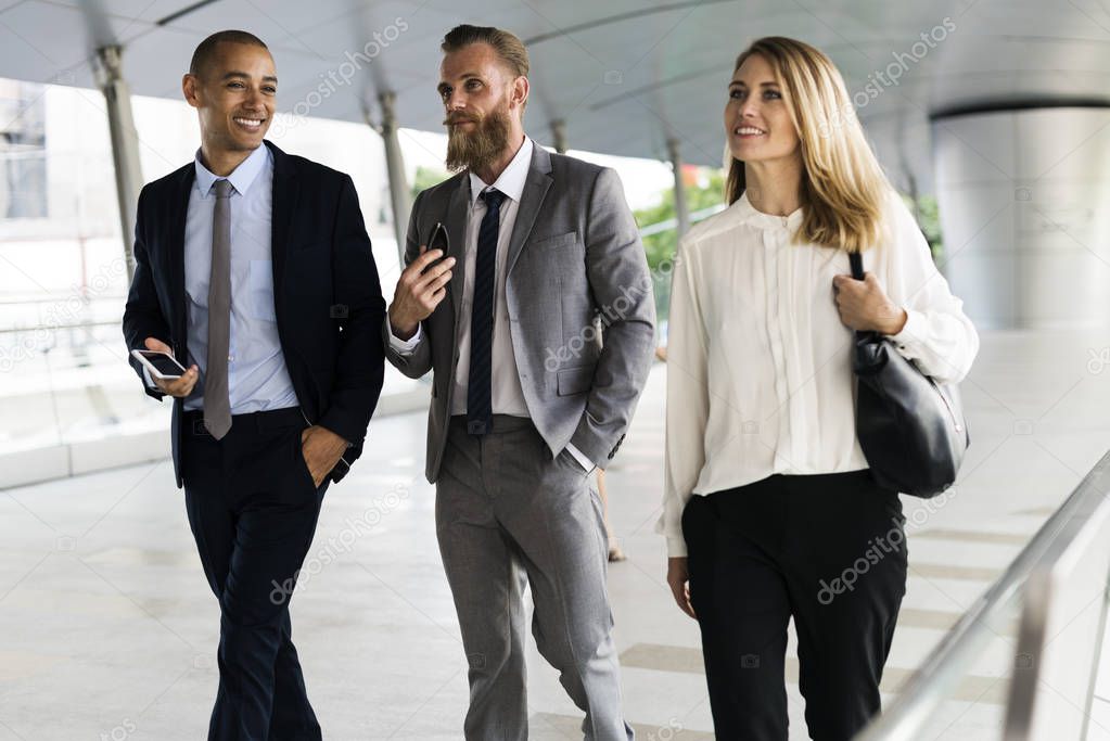 Business people walking and discussing