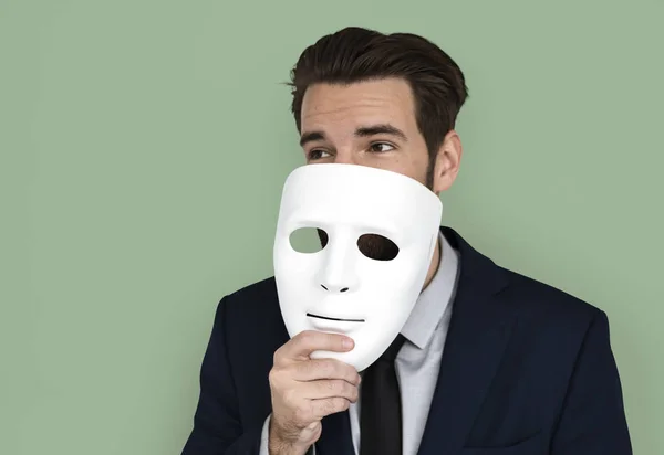 Бізнесмен холдингу маска — стокове фото