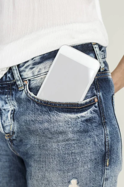 인간 바지 주머니에 휴대 전화 — 스톡 사진