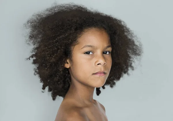 Criança africana com penteado afro — Fotografia de Stock