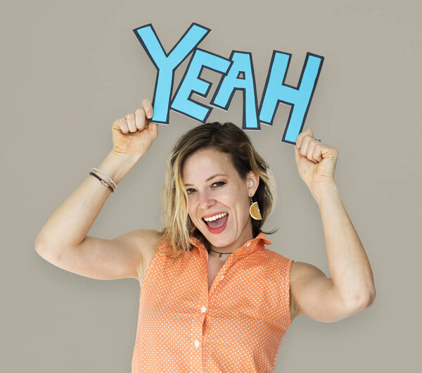  woman holding yeah sign