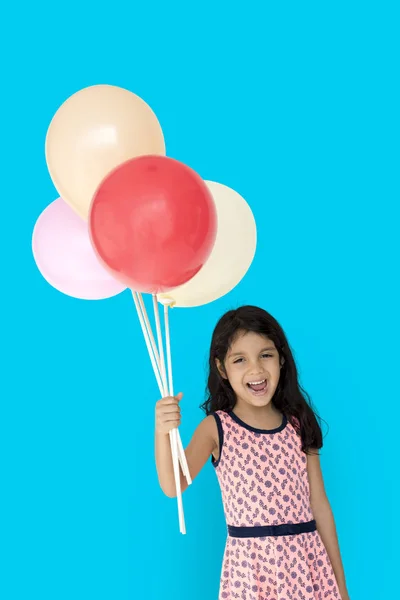 Menina segurando balões — Fotografia de Stock