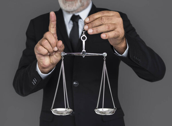 senior businessman with Warning Scale