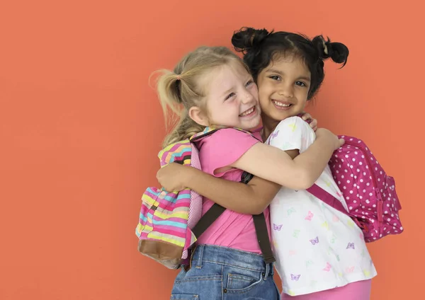 Leuke meisjes met zakken in de studio — Stockfoto