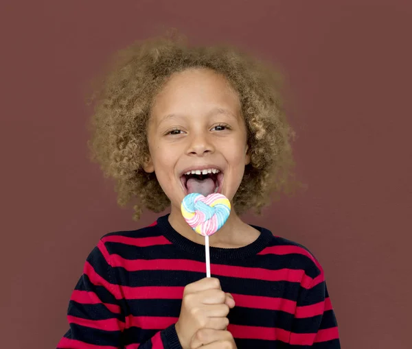 Jongen eten lolly — Stockfoto