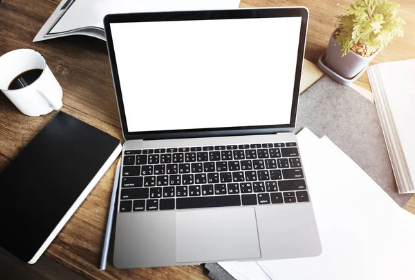 Laptop on wooden table — Stock Photo, Image