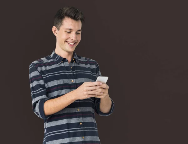 Young Man Using smartphone — Stock Photo, Image