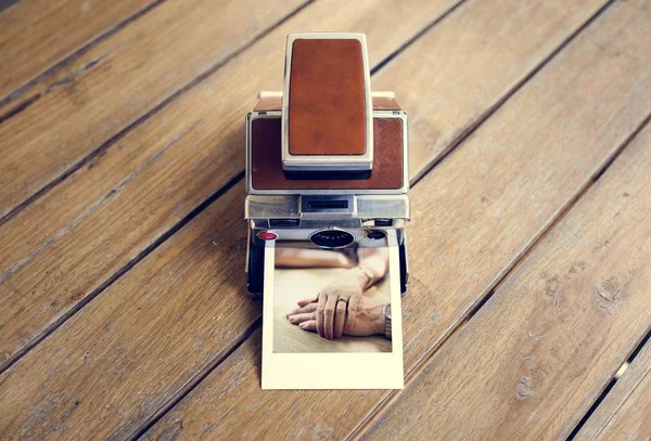 Vintage instant photo camera — Stock Photo, Image