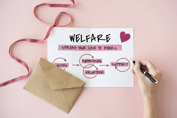 Person writing on greeting card — Stock Photo, Image