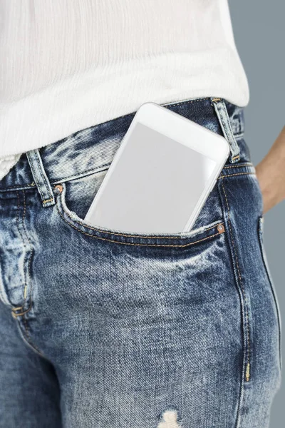 인간 바지 주머니에 휴대 전화 — 스톡 사진