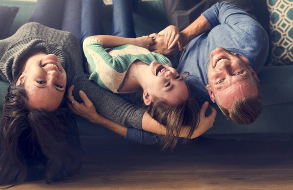 parents with little daughter 