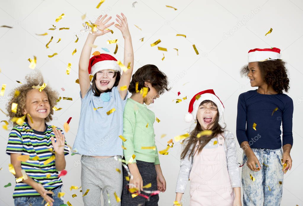 children playing with confetti 