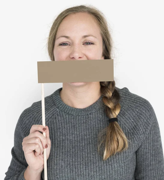 Mujer sosteniendo la bandera que cubre la boca —  Fotos de Stock