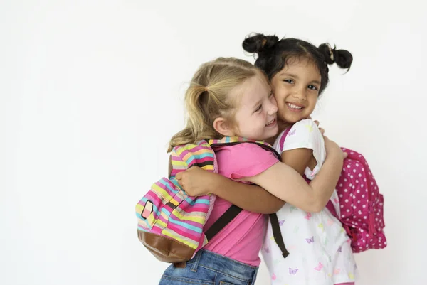 Leuke meisjes met zakken in de studio — Stockfoto