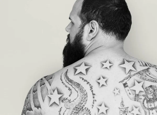 Man met tattoo op rug — Stockfoto