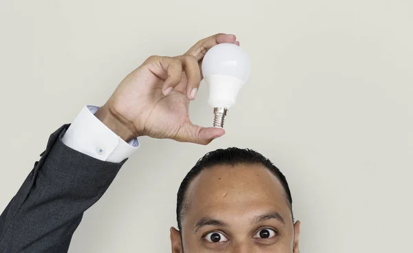 Indiano empresário com lâmpada — Fotografia de Stock