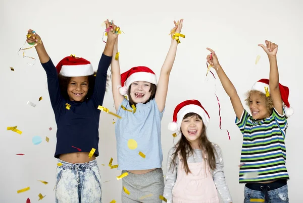 Children playing with confetti — Stock Photo, Image