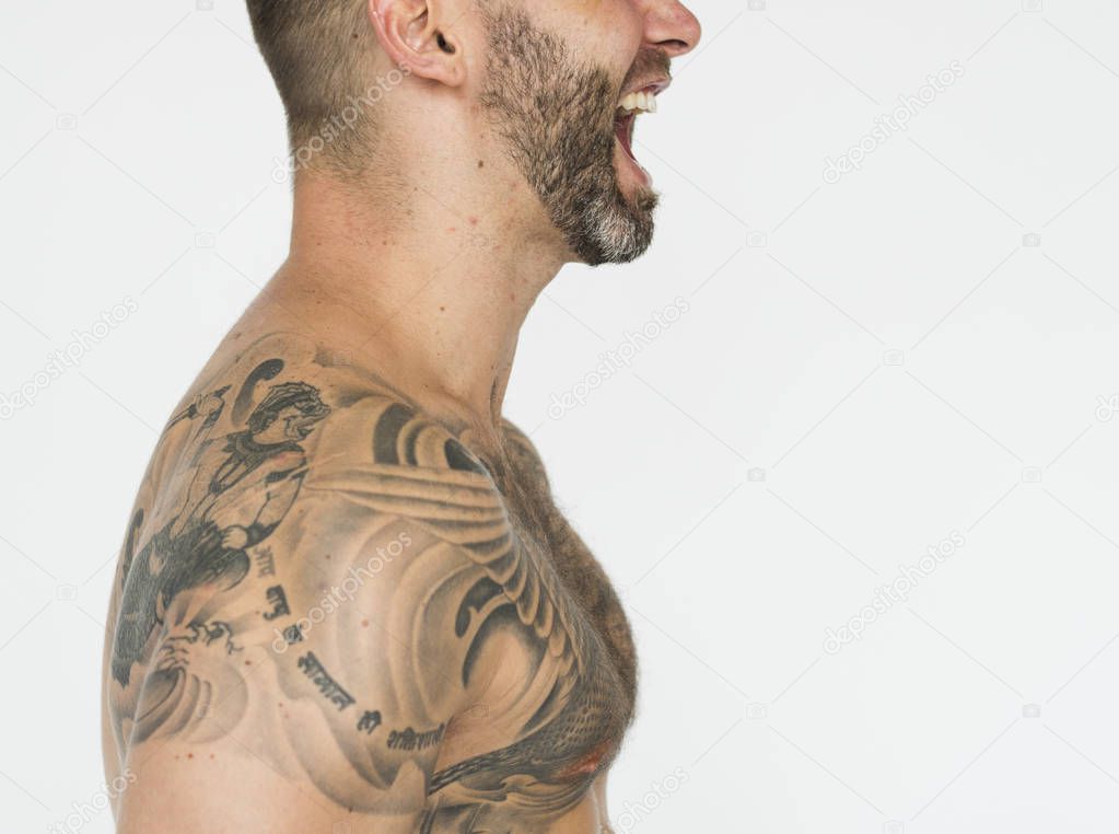 screaming man with tattoos