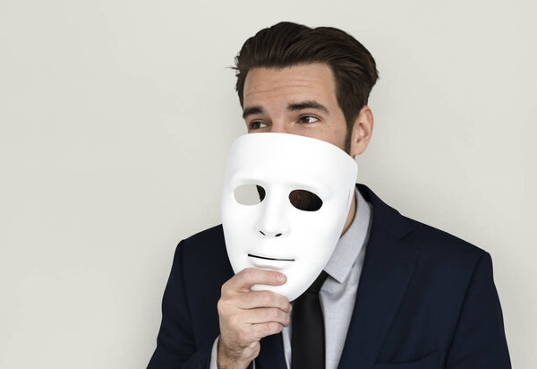 Man holding mask