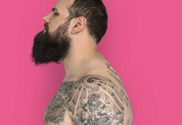 Muž s plnovousem a tetování — Stock fotografie