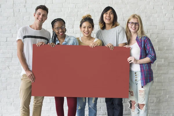 Young people holding banner — Stock Photo, Image