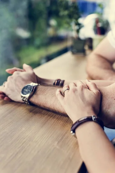 Romantic couple holding hands — Stock Photo, Image