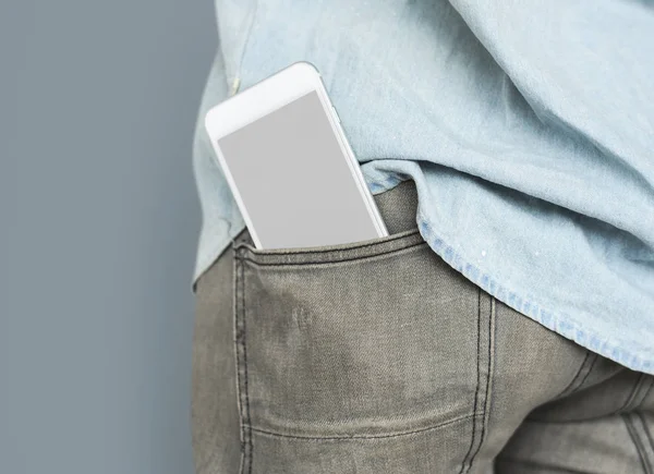 Telefone inteligente no bolso — Fotografia de Stock