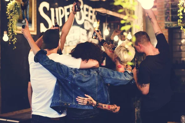 People Enjoying Drinks at party