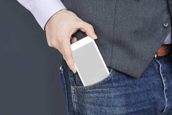 Mobiele telefoon in de zak — Stockfoto