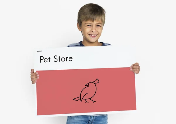 Little boy holding banner — Stock Photo, Image