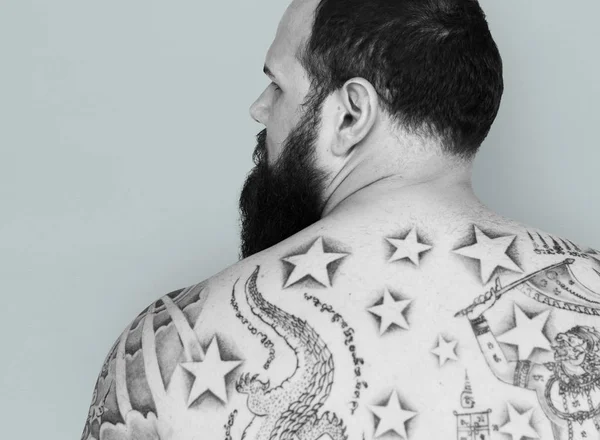 Man met tattoo op rug — Stockfoto