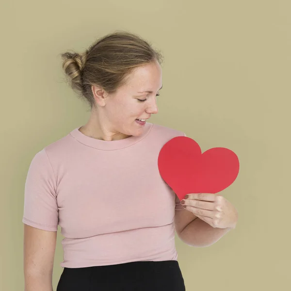 Woman holding red heart — Stock Photo, Image