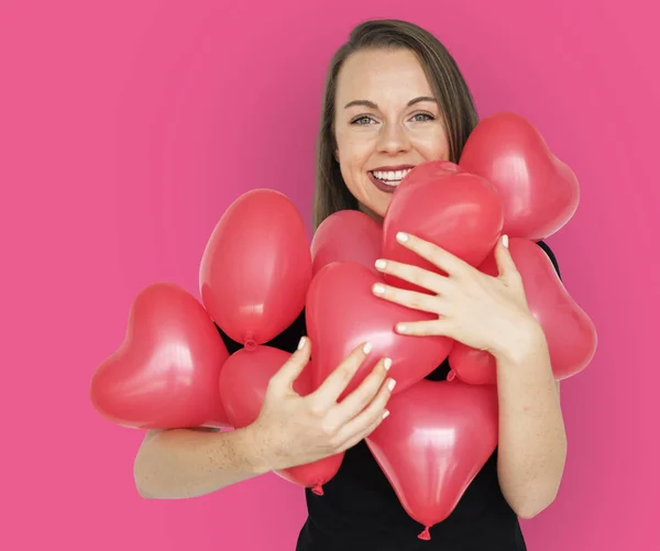 Smiling woman with balloons — Stock Photo, Image