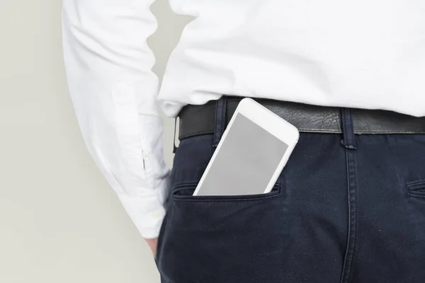 Telefono cellulare in tasca — Foto Stock
