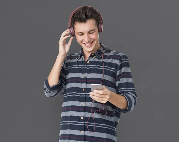 Young man in headphones — Stock Photo, Image