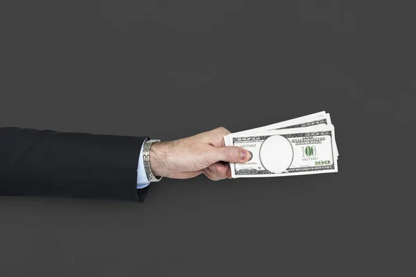 Mano masculina sosteniendo dinero — Foto de Stock