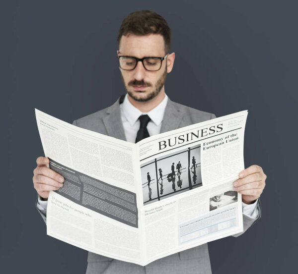 Man reading newspaper