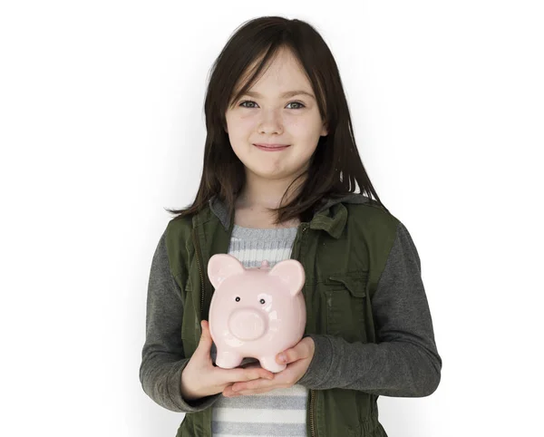 Little girl holding piggybank — Stock Photo, Image
