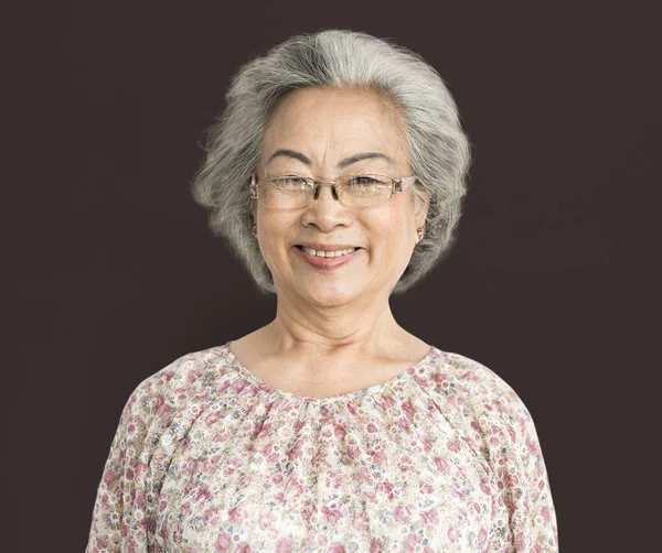 Senior woman posing in studio — Stock Photo, Image