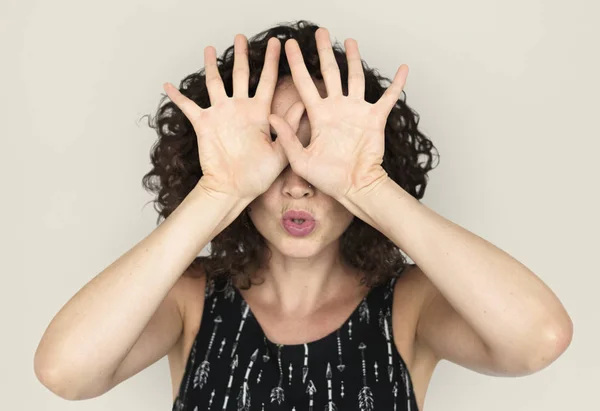 Mujer con la cara cubierta de pelo rizado —  Fotos de Stock