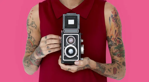 Woman holding two lens camera — Stock Photo, Image