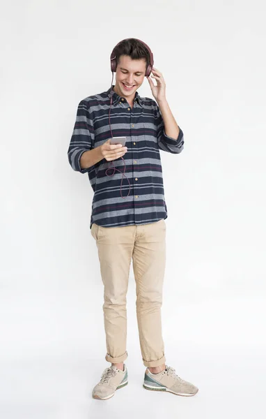 Young man in headphones — Stock Photo, Image