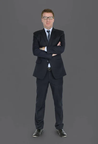 Businessman in suit holding arms crossed — Stock Photo, Image