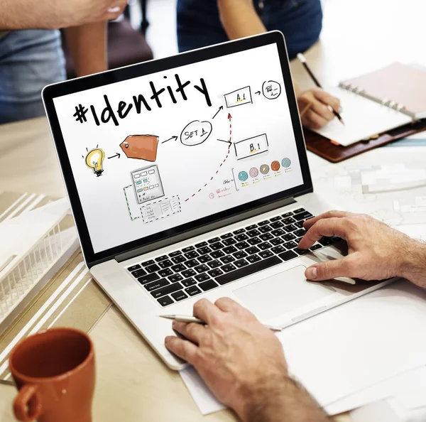 Man at meeting using laptop computer — Stock Photo, Image