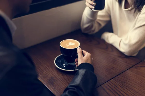 Couple resting in coffee shop — Stock Photo, Image